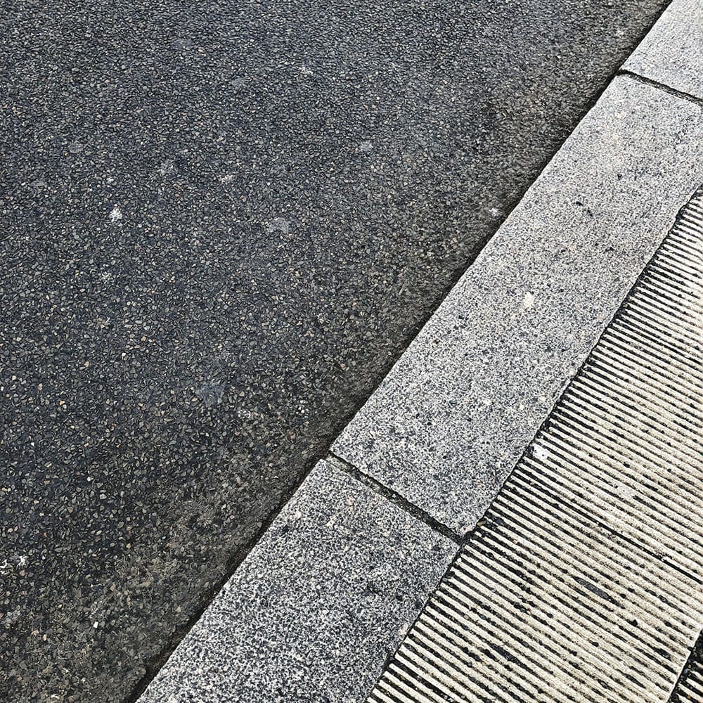 Granite curbs, navigating through a bustling city environment